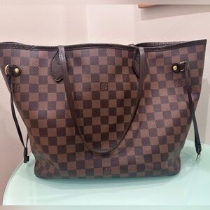 Yes it’s your gently cared for Louis Vuitton Never Full MM!